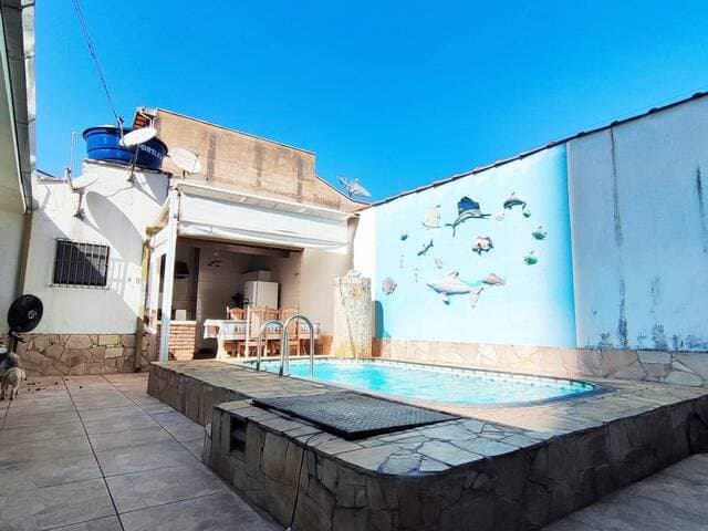 Casa com piscina no Centro